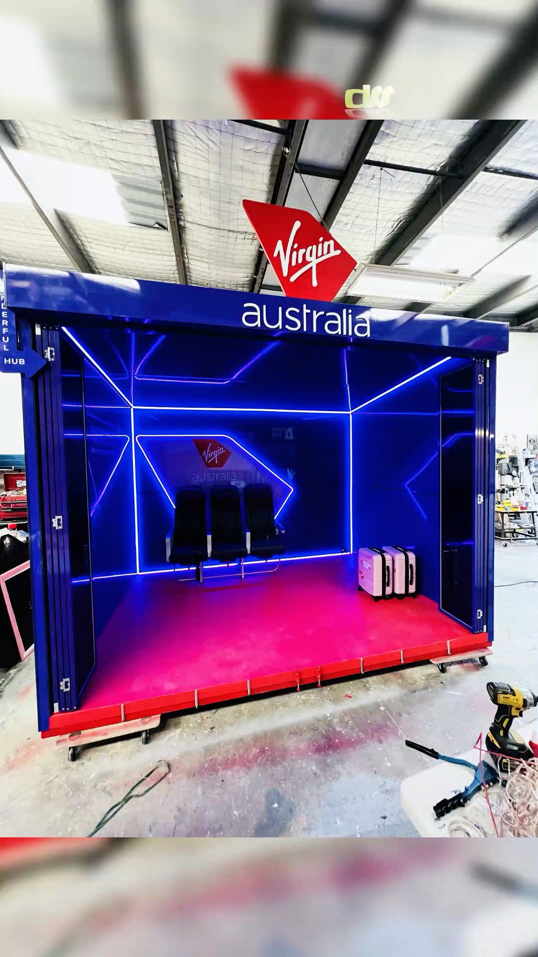 Virgin Australia neon container in the DSS workshop
